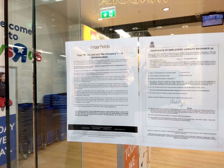 A notice informing customers of the collapse of Toys R Us is stuck on the window of its High Wycombe store